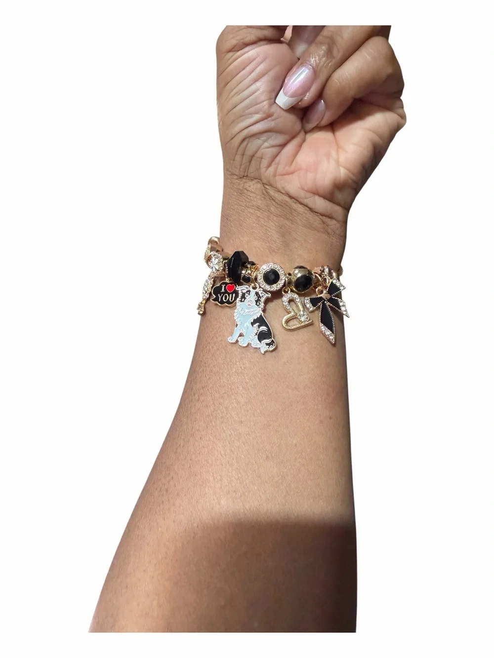 Gold Tone Charm Adjustable Twisted Bangle W/Black & White Dog and Heart Charms